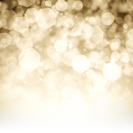 abstract gold bokeh glitter backgroundの写真素材