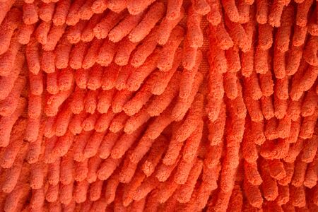 Red towel close-up fabric and texture background.の写真素材