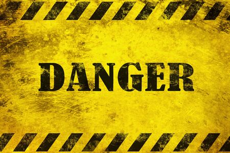Danger black text on yellow background.の写真素材