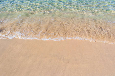 Clear blue transparent tropical summer beach water backgroundの写真素材