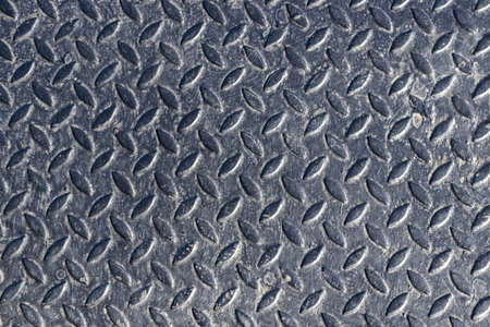 Non-slip metal steel plates background.