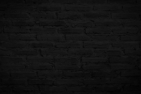 Solid black brick wall background texture.の写真素材