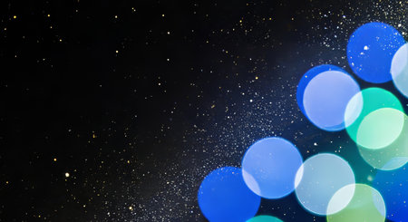 Colorful bokeh lights on black background. Abstract background.の写真素材