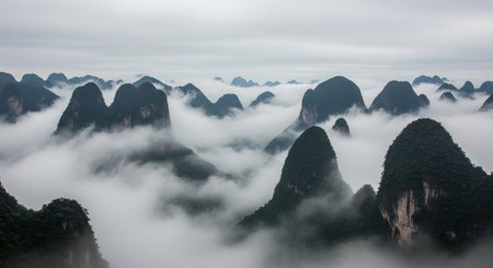 Panoramic view of the mountains in the fog. China.