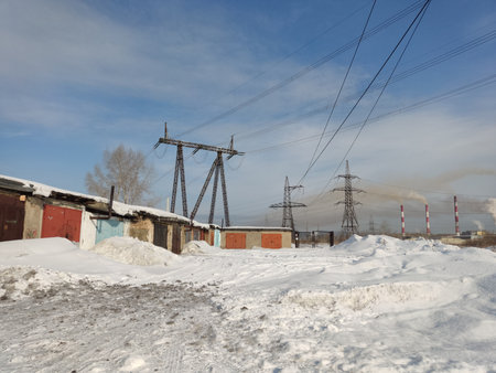 Power lines in winter. Power station in winter. Power plant in winter.の写真素材