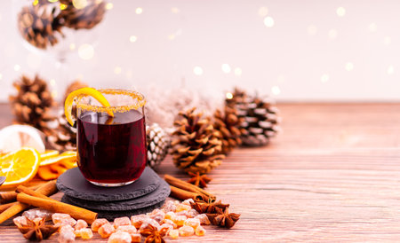Gluhwein sweet hot warm Mulled red Wine or punch tea in mug cup glass spices citrus aromatic cinnamon star anise German tradition winter Christmas market beverage drink new year holidays festival