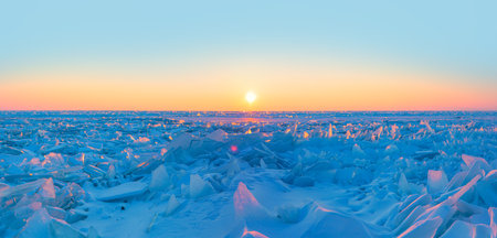 Beautiful winter landscape of frozen Lake Baikal at sunriseの写真素材