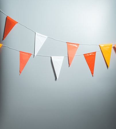 Party flags for decoration and covering on gray backgroundの写真素材
