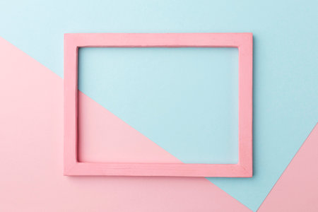Flat lay beautiful pink wooden frame conceptの写真素材