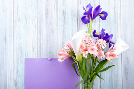 Bouquet of pink tulips with paper hearts on a green backgroundの写真素材
