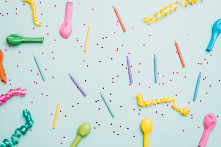 Birthday party background with balloons and confetti. Flat lay, top viewの写真素材