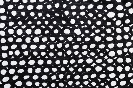 Texture, background, pattern. Cloth cotton black and white with white dots