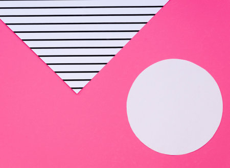 White circle and black stripes on pink background. Minimal concept.の写真素材