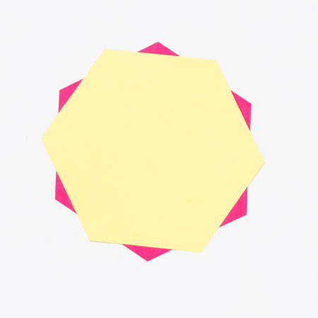 Colored paper on white background with copy space for your text.