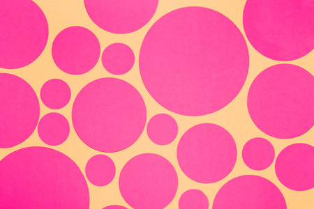abstract pink circles on yellow background, can be used as backgroundの写真素材