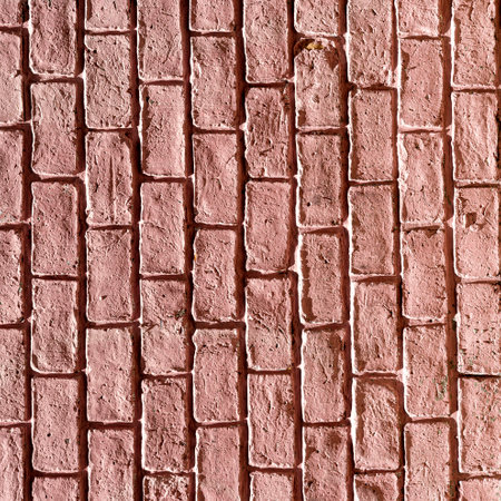 abstract background of old vintage brick wall in red and pink colors