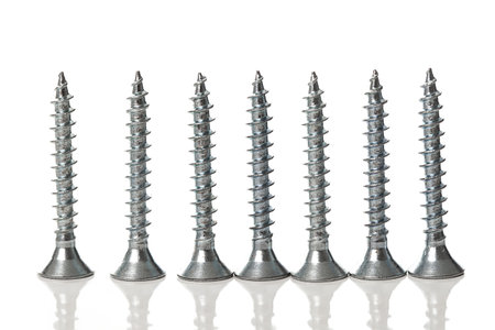 Silver new nails on a white backgroundの写真素材