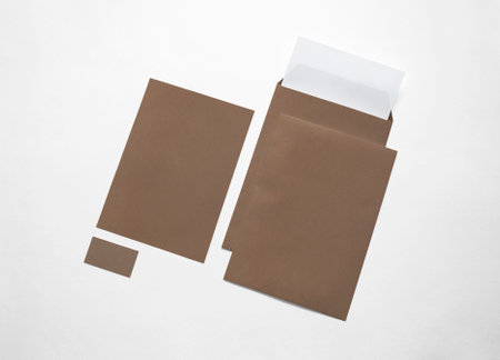 Carton paper stationery isolated on white. Illustration. Blank envelopes, letterheads and cards to...