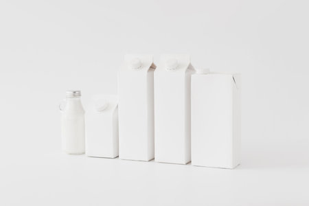Milk Bottle Mock-Up - Three blank packaging isolated on whiteの写真素材