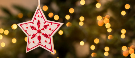 Christmas decoration hanging on christmas tree with bokeh lights background