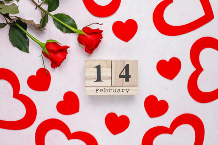 Valentine's day background with red hearts, roses and wooden calendar