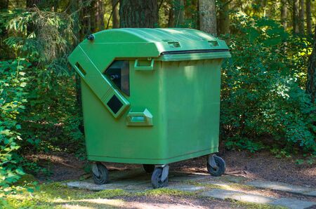 Green plastic trash recycling container ecology conceptの写真素材