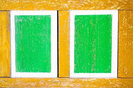 Abstract seamless pattern for designers with square tiles of green, white and yellow paint oil stain on woodの写真素材