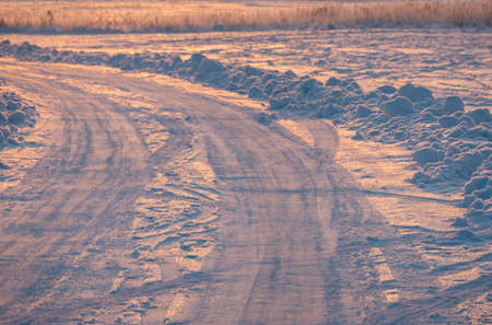 winter landscape, tire tracks on the snow, snow road. High quality photoの写真素材