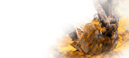 The road excavator bucket distributes the sand, creating a fentry through the ditch. Close-up image on the white background. Copy space. High quality photoの写真素材