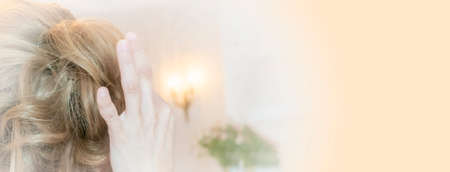 Portrait a close up of the girl in the bride's dress on a white background natural make-up. Concept of beauty and wedding. high quality photoの写真素材