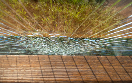Broken glass at a street bus stop . High quality photoの写真素材
