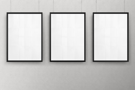 Front Poster Frame on Gray Wall Backgroundの写真素材