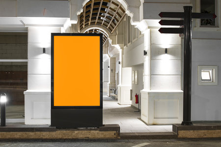 Advertising Outdoor City Light Poster on Blank Vertical Billboard in the Cityの写真素材