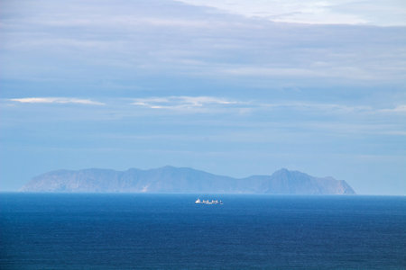Sailing the Seas: Boat in Front of Galite Island, Tunisiaの写真素材