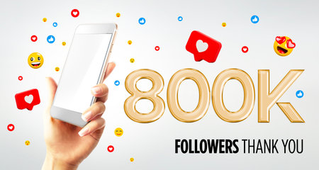 800k followers celebration. Hand holding mobile smartphone with blank screen. Mockup. Social media...