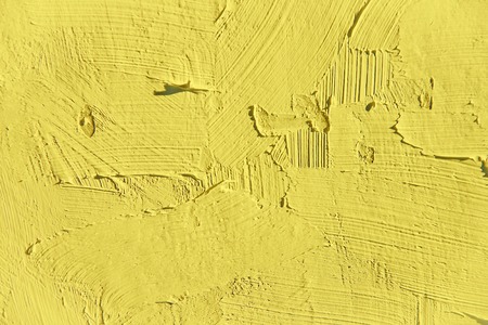 Painting closeup texture.Plain light yellow color background for vivid, colorful,creative backgrounds. Oil on canvas brush strokes texture. For web and design.の写真素材