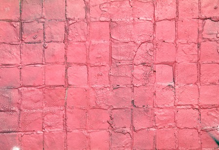 Painted mosaic brick tile wall, close up of graffiti texture, with vibrant colors for creativity, imaginative backgrounds and ideas.の写真素材