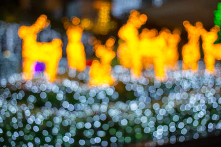 Bokeh of reindeer yellow light bulb.の写真素材