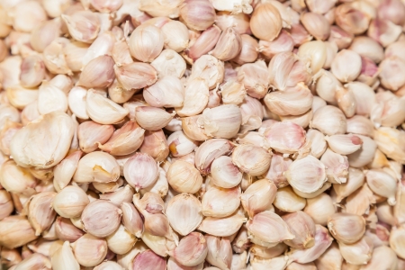 Top view of close up of garlic on market of Thailandの写真素材