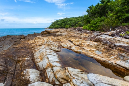 Beautiful stone with beautiful sea and blue sky for background useの写真素材