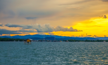 PETCHABURI,THAILAND - SEPTEMBER 4 The beautiful landscape sunset of Bangtaboon gulf with house in the sea at Bangtoboon on September 4,2013 in Perchaburi,Thailand のeditorial素材