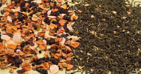 Fruit and green tea with jasmine blossomsの写真素材