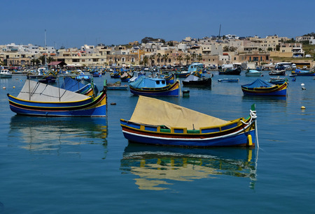 Traditional colorful luzzu boats in Marsaxlokk, Maltaの写真素材