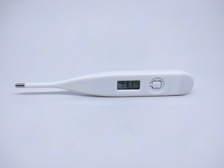 Electronic body thermometer displaying healthy human body temperature. isolated on white.