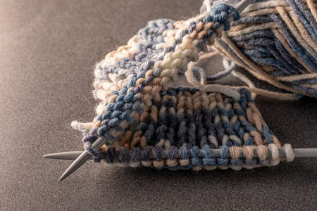 Photo of colored balls from knitting yarn. Knitting supplies close-up. Knitting-women's needlework.