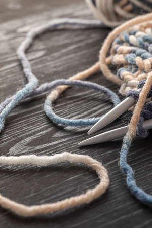 Photo of colored balls from knitting yarn. Knitting supplies close-up. Knitting-women's needlework.の写真素材