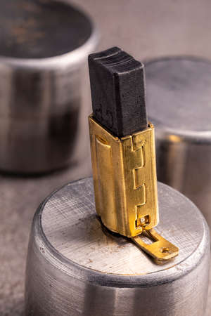 Electrically conductive graphite brush of a motor. Spare part for power tools.の写真素材
