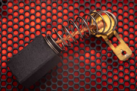Electrically conductive graphite brush of a motor. Spare part for power tools.の写真素材