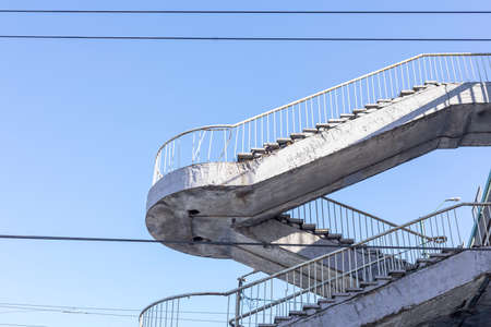 Fragment of staircase of pedestrian bridge over railway. Transport infrastructure.