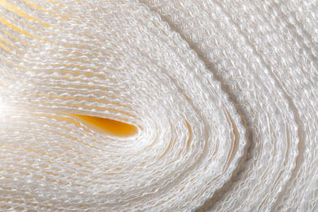 Disposable paper table napkins close up. White paper napkins.の写真素材